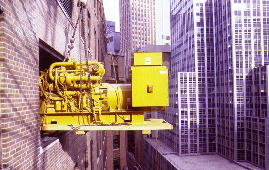 A generator being moved into the Financial District Carrier Hotel
